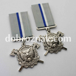 Виготовлення відзнак методом штампування латуні. Покриття - нікель Dobroznak.