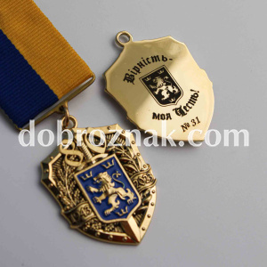 Виготовлення відзнак методом штампування латуні, гравіювання. Покриття - позолота.