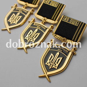 Виготовлення відзнак методом штампування латуні. Покриття - нікель Dobroznak.