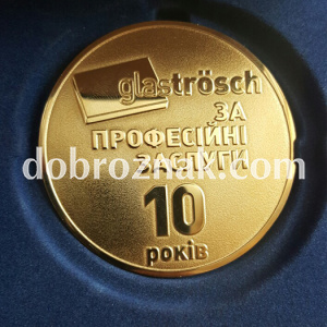 Виготовлення медалі методом травлення, гальванічне покриття – позолота.